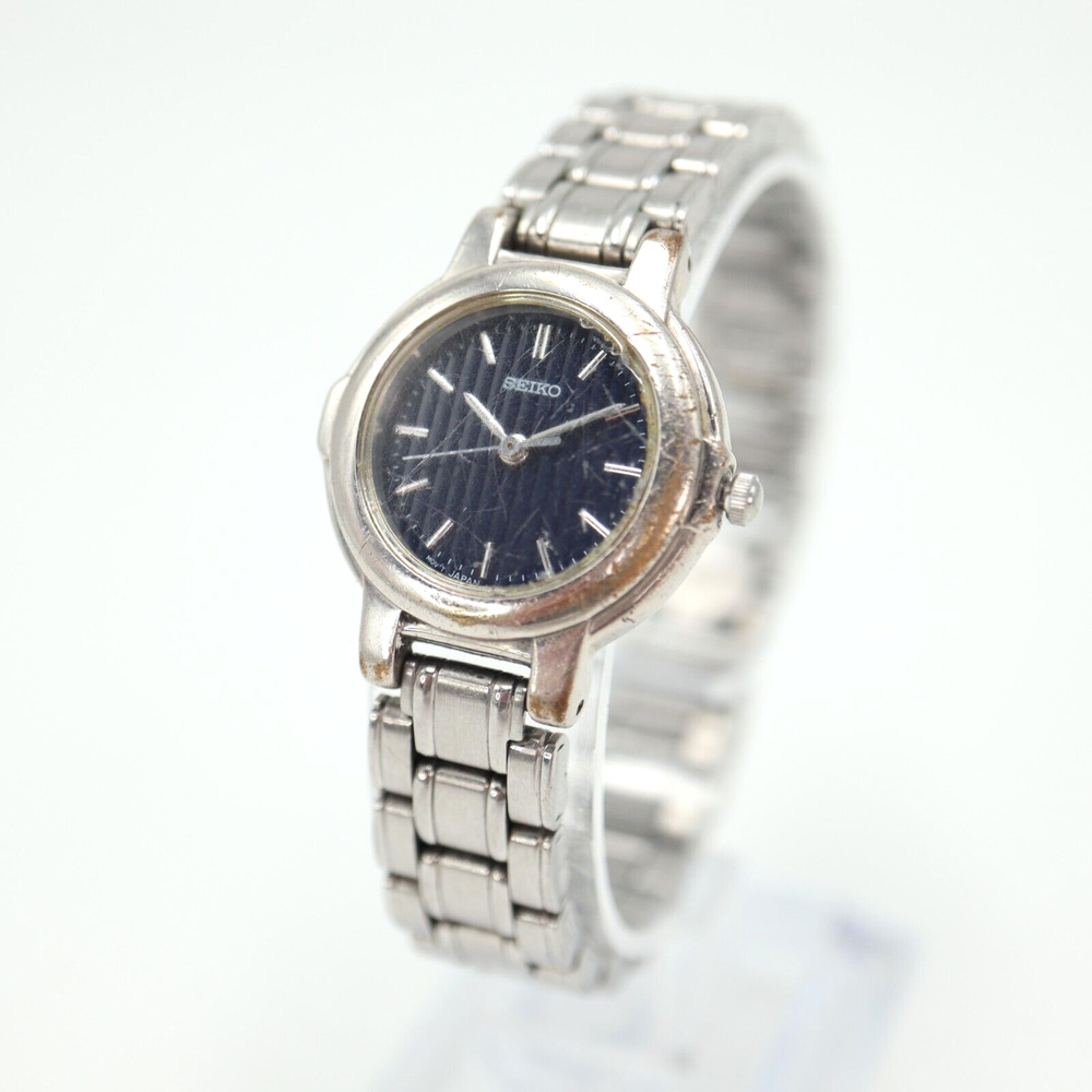 Vintage Seiko Watch Women Silver Tone 25mm V701-2F50 with New Battery 6.25"